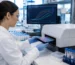Researcher running HCG immunoassay in research laboratory