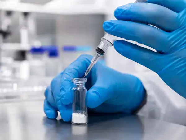 Reconstituting Hexarelin Acetate with bacteriostatic water in a lab