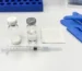 Peptide reconstitution supplies on laboratory bench for KLOW blend research